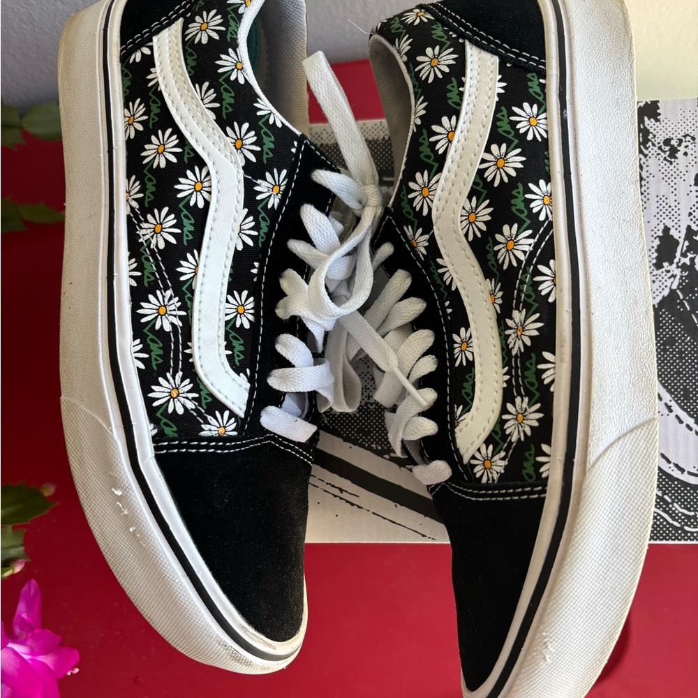 Vans Black Daisy-Print Sneakers. Note scuffs on side of each shoe.